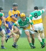 8 July 2006; Tony Carmody, Clare, in action against Ger Oakley, Offaly. Guinness All-Ireland Senior Hurling Championship Qualifier, Round 3, Clare v Offaly, Cusack Park, Ennis, Co. Clare. Picture credit: Kieran Clancy / SPORTSFILE