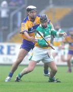 8 July 2006; Gerry Quinn, Clare, tackles Dylan Hayden, Offaly. Guinness All-Ireland Senior Hurling Championship Qualifier, Round 3, Clare v Offaly, Cusack Park, Ennis, Co. Clare. Picture credit: Kieran Clancy / SPORTSFILE