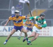 8 July 2006;  Gerry Quinn, Clare, in action against Dylan Hayden, Offaly. Guinness All-Ireland Senior Hurling Championship Qualifier, Round 3, Clare v Offaly, Cusack Park, Ennis, Co. Clare. Picture credit: Kieran Clancy / SPORTSFILE