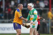 8 July 2006; Colin Lynch, Clare, shakes hands with Brian Whelahan, Offaly. Guinness All-Ireland Senior Hurling Championship Qualifier, Round 3, Clare v Offaly, Cusack Park, Ennis, Co. Clare. Picture credit: Kieran Clancy / SPORTSFILE