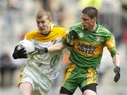 9 July 2006; Justin Crozier, Antrim, in action against Paul Thornton, Donegal. ESB Ulster Minor Football Championship Final, Donegal v Antrim, Croke Park, Dublin. Picture credit: Pat Murphy / SPORTSFILE