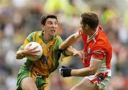 9 July 2006; Michael Hegarty, Donegal, in action against John McEntee, Armagh. Bank of Ireland Ulster Senior Football Championship Final, Donegal v Armagh, Croke Park, Dublin. Picture credit: Pat Murphy / SPORTSFILE