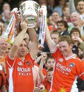 9 July 2006; Armagh's Enda McNulty, left, and Francie Bellew, right, lift the Anglo Celt cup. Bank of Ireland Ulster Senior Football Championship Final, Donegal v Armagh, Croke Park, Dublin. Picture credit: Pat Murphy / SPORTSFILE