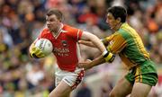 9 July 2006; Ronan Clarke, Armagh, in action against Paddy Campbell, Donegal. Bank of Ireland Ulster Senior Football Championship Final, Donegal v Armagh, Croke Park, Dublin. Picture credit: Pat Murphy / SPORTSFILE