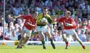 9 July 2006; Paul Galvin, Kerry, in action against Kieran O'Connor, left, and Michael Prout, Cork. Bank of Ireland Munster Senior Football Championship Final, Kerry v Cork, Fitzgerald Stadium, Killarney, Co. Kerry. Picture credit: Brendan Moran / SPORTSFILE