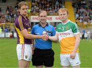 25 June 2014; Referee Seán Cleere with Wexford captain Shane O'Gorman, left, and Offaly captain Niall Wynne. Bord Gáis Energy Leinster GAA Hurling Under 21 Championship, Semi-Final, Wexford v Offaly, Wexford Park, Wexford. Picture credit: Matt Browne / SPORTSFILE