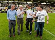 22 June 2014; Donegal manager Jim McGuinness is surrounded by journalists after the game. Ulster GAA Football Senior Championship, Semi-Final, Donegal v Antrim, St Tiernach's Park, Clones, Co. Monaghan. Picture credit: Oliver McVeigh / SPORTSFILE