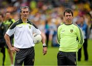 22 June 2014; Donegal manager Jim McGuinness, left, along with Donegal selector John Duffy. Ulster GAA Football Senior Championship, Semi-Final, Donegal v Antrim, St Tiernach's Park, Clones, Co. Monaghan. Picture credit: Oliver McVeigh / SPORTSFILE