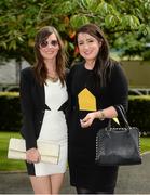 27 June 2014: Marise Kiely, left, from Kilkenny, and Amanda Weir, from Castleknock, Dublin, enjoying a day at the races. Curragh Racecourse, The Curragh, Co. Kildare. Picture credit: Barry Cregg / SPORTSFILE
