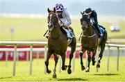 27 June 2014: Feach Ar Agaidh, with Kevin Manning up, on their way to winning the Dublin Coach To The Curragh Races European Breeders Fund Maiden. Curragh Racecourse, The Curragh, Co. Kildare. Picture credit: Barry Cregg / SPORTSFILE