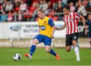 27 June 2014; Daryl Hargan, Dundalk, in action against Mark Timlin, Derry City. SSE Airtricity League Premier Division, Derry City v Dundalk, Brandywell, Derry. Picture credit: Oliver McVeigh / SPORTSFILE
