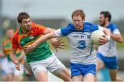 28 June 2014; Liam Ó Lionáin, Waterford, in action against Daniel St Ledger, Carlow. GAA Football All Ireland Senior Championship, Round 1B, Carlow v Waterford, Dr. Cullen Park, Carlow. Picture credit: Piaras Ó Mídheach / SPORTSFILE