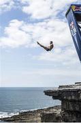 28 June 2014; Michal Navratil dives from the 28 metre platform during the seeding round of the third stop of the Red Bull Cliff Diving World Series. Inis Mor, Aran Islands, Co. Galway. Picture credit: Romina Amato / SPORTSFILE