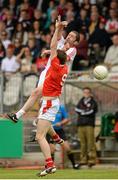 28 June 2014; Stephen O'Neill, Tyrone, in action against Mick Fanning, Louth. GAA Football All Ireland Senior Championship, Round 1B, Tyrone v Louth, Healy Park, Omagh, Co. Tyrone. Picture credit: Oliver McVeigh / SPORTSFILE