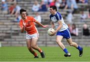 28 June 2014; Michael Murnaghan, Monaghan, in action against Conor Grimley, Armagh. Electric Ireland Ulster GAA Football Minor Championship Semi-Final, St Tiernach's Park, Clones, Co. Monaghan. Picture credit: Ramsey Cardy / SPORTSFILE