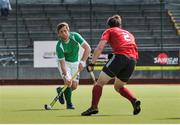 28 June 2014: Shane O'Donoghue, Ireland, in action against Benjamin Carless, Wales. Men's International Hockey, Ireland v Wales, National Hockey Stadium, UCD, Belfield, Dublin. Picture credit; Ashleigh Fox / SPORTSFILE