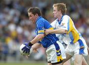 1 July 2006; Damian O'Brien, Tipperary, in action against Declan Reilly, Longford. Bank of Ireland All-Ireland Senior Football Championship Qualifier, Round 2, Longford v Tipperary, Pearse Park, Longford. Picture credit: Pat Murphy / SPORTSFILE