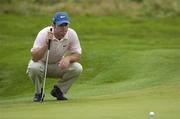 6 July 2006; Paul Casey lines up a putt on the 1st green during the 1st round of the Kappa Smurfit European Open Golf Championship. K Club, Straffan, Co. Kildare. Picture credit: Damien Eagers / SPORTSFILE