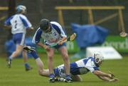8 July 2006; Dave Bennett, Waterford, in action against Joe Fitzpatrick, Laois. Guinness All-Ireland Senior Hurling Championship Qualifier, Round 3, Laois v Waterford, O'Moore Park, Portlaoise, Co. Laois. Picture credit: Brendan Moran / SPORTSFILE