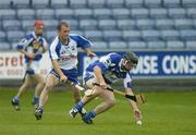 8 July 2006; Shane Dollard, Laois, in action against Eoin McGrath, Waterford. Guinness All-Ireland Senior Hurling Championship Qualifier, Round 3, Laois v Waterford, O'Moore Park, Portlaoise, Co. Laois. Picture credit: Brendan Moran / SPORTSFILE