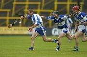 8 July 2006; Eoin McGrath, Waterford, in action against Shane Dollard and Brian Campion, right, Laois. Guinness All-Ireland Senior Hurling Championship Qualifier, Round 3, Laois v Waterford, O'Moore Park, Portlaoise, Co. Laois. Picture credit: Brendan Moran / SPORTSFILE