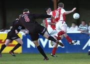 14 July 2006; Gareth Farrelly, Bohemians player manager, scores his side's first goal from a free kick despitew the challange of Trevor Molloy, St. Patrick's Athletic. eircom League, Premier Division, St. Patrick's Athletic v Bohemians, Richmond Park, Dublin. Picture credit: David Maher / SPORTSFILE