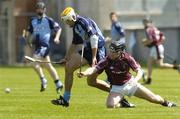 15 July 2006; David Curtin, Dublin, in action against Derek McNichols, Westmeath. Guinness Senior Hurling Championship, Relegation Final, Dublin v Westmeath, O'Connor Park, Tullamore, Co. Offaly. Picture credit: Pat Murphy / SPORTSFILE