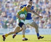 15 July 2006; Graham Geraghty, Meath, in action against Aidan Fennelly, Laois. Bank of Ireland All-Ireland Senior Football Championship Qualifier, Round 3, Meath v Laois, Pairc Tailteann, Navan, Co. Meath. Picture credit: Brendan Moran / SPORTSFILE