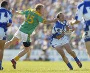 15 July 2006; Tom Kelly, Laois, in action against Graham Geraghty, Meath. Bank of Ireland All-Ireland Senior Football Championship Qualifier, Round 3, Meath v Laois, Pairc Tailteann, Navan, Co. Meath. Picture credit: Brendan Moran / SPORTSFILE