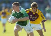 15 July 2006; Tom Brewster, Fermanagh, in action against Diarmuid Kinsella, Wexford. Bank of Ireland All-Ireland Senior Football Championship Qualifier, Round 3, Fermanagh v Wexford, Brewster Park, Enniskillen, Co. Fermanagh. Picture credit: Damien Eagers / SPORTSFILE