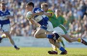 15 July 2006; Padraig McMahon, Laois, in action against Graham Geraghty, Meath. Bank of Ireland All-Ireland Senior Football Championship Qualifier, Round 3, Meath v Laois, Pairc Tailteann, Navan, Co. Meath. Picture credit: Brendan Moran / SPORTSFILE