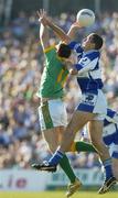 15 July 2006; Joe Sheridan, Meath, contests a high ball with Darren Rooney, Laois. Bank of Ireland All-Ireland Senior Football Championship Qualifier, Round 3, Meath v Laois, Pairc Tailteann, Navan, Co. Meath. Picture credit: Brendan Moran / SPORTSFILE