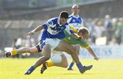 15 July 2006; Brendan Quigley, Laois, holds off the challenge of Graham Geraghty, Meath. Bank of Ireland All-Ireland Senior Football Championship Qualifier, Round 3, Meath v Laois, Pairc Tailteann, Navan, Co. Meath. Picture credit: Brendan Moran / SPORTSFILE
