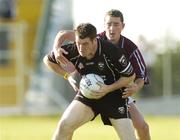 15 July 2006; John McPartland, Sligo, in action against Gary Glennon, Westmeath. Bank of Ireland All-Ireland Senior Football Championship Qualifier, Round 3, Sligo v Westmeath, Markievicz Park, Sligo. Picture credit: Pat Murphy / SPORTSFILE