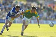 15 July 2006; Kevin Reilly, Meath, in action against Brian McDonald, Laois. Bank of Ireland All-Ireland Senior Football Championship Qualifier, Round 3, Meath v Laois, Pairc Tailteann, Navan, Co. Meath. Picture credit: Brendan Moran / SPORTSFILE