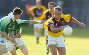 15 July 2006; Rory Stafford, Wexford, in action against Raymond Johnston, Fermanagh. Bank of Ireland All-Ireland Senior Football Championship Qualifier, Round 3, Fermanagh v Wexford, Brewster Park, Enniskillen, Co. Fermanagh. Picture credit: Damien Eagers / SPORTSFILE