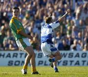 15 July 2006; Ross Munnelly, Laois, celebrates scoring his side's first goal as Meath's Seamus Kenny looks on. Bank of Ireland All-Ireland Senior Football Championship Qualifier, Round 3, Meath v Laois, Pairc Tailteann, Navan, Co. Meath. Picture credit: Brendan Moran / SPORTSFILE