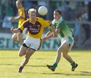 15 July 2006; Niall Murphy, Wexford, in action against Adrian Little, Fermanagh. Bank of Ireland All-Ireland Senior Football Championship Qualifier, Round 3, Fermanagh v Wexford, Brewster Park, Enniskillen, Co. Fermanagh. Picture credit: Damien Eagers / SPORTSFILE