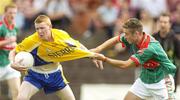 16 July 2006; James McKeague, Roscommon, in action against Brian Gibbons, Mayo. ESB Connacht Minor Football Championship Final, Mayo v Roscommon, McHale Park, Castlebar, Co. Mayo. Picture credit: Pat Murphy / SPORTSFILE