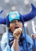 16 July 2006; A young Dublin supporter enjoys her ice cream before the start of the game. Bank of Ireland Leinster Senior Football Championship Final, Dublin v Offaly, Croke Park, Dublin. Picture credit: David Maher / SPORTSFILE