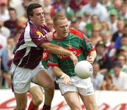 16 July 2006; Ger Brady, Mayo, in action against Padraic Joyce, Galway. Bank of Ireland Connacht Senior Football Championship Final, Mayo v Galway, McHale Park, Castlebar, Co. Mayo. Picture credit: Pat Murphy / SPORTSFILE