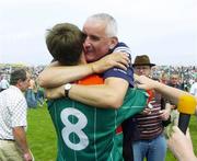 16 July 2006; Mayo manager Mickey Moran embraces Mayo's Ronan McGarrity at the end of the match. Bank of Ireland Connacht Senior Football Championship Final, Mayo v Galway, McHale Park, Castlebar, Co. Mayo. Picture credit: Damien Eagers / SPORTSFILE