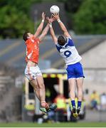 28 June 2014; Ethan Rafferty, Armagh, in action against Darren Hughes, Monaghan. Ulster GAA Football Senior Championship, Semi-Final, Armagh v Monaghan, St Tiernach's Park, Clones, Co. Monaghan. Picture credit: Ramsey Cardy / SPORTSFILE