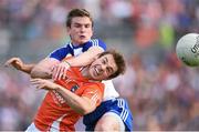 28 June 2014; Kevin Dyas, Armagh, in action against Dessie Mone, Monaghan. Ulster GAA Football Senior Championship, Semi-Final, Armagh v Monaghan, St Tiernach's Park, Clones, Co. Monaghan. Picture credit: Brendan Moran / SPORTSFILE