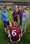 28 June 2014; Galway's Iarla Tannian signing autographs after the game. Leinster GAA Hurling Senior Championship, Semi-Final Replay, Kilkenny v Galway, O'Connor Park, Tullamore, Co. Offaly. Picture credit: Ray McManus / SPORTSFILE