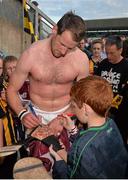 28 June 2014; Jackie Tyrrell signs a hurley for a young supporter. Leinster GAA Hurling Senior Championship, Semi-Final Replay, Kilkenny v Galway, O'Connor Park, Tullamore, Co. Offaly. Picture credit: Ray McManus / SPORTSFILE