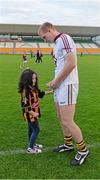 28 June 2014; Henry Shefflin, Kilkenny, with seven year old Niamh Cuggy, from Castleknock, Dublin, long after the final whistle. Leinster GAA Hurling Senior Championship, Semi-Final Replay, Kilkenny v Galway, O'Connor Park, Tullamore, Co. Offaly. Picture credit: Ray McManus / SPORTSFILE