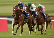 29 June 2014: Gleneagles, with Joseph O'Brien up, pulls clear from Stevie's Wonder, with Colin Keane up, who finished second, and Syntax, with Niall McCullagh up, who finished fifth, on their way to winning the Barronstown Stud European Breeders Fund Maiden. Curragh Racecourse, The Curragh, Co. Kildare. Picture credit: Barry Cregg / SPORTSFILE