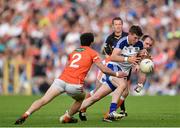 28 June 2014; Darren Hughes, Monaghan, in action against James Morgan, left, and Ciaran McKeever, Armagh. Ulster GAA Football Senior Championship, Semi-Final, Armagh v Monaghan, St Tiernach's Park, Clones, Co. Monaghan. Picture credit: Ramsey Cardy / SPORTSFILE