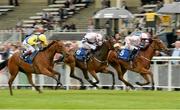 29 June 2014: I Am Beautiful, right, with Seamie Heffernan up, races ahead of Jeanne Girl, centre, who came second, with Niall McCullagh up, and Quinta Verde, left, who came third, with Jamie Spencer up, on their way to winning the Grangecon Stud Stakes. Curragh Racecourse, The Curragh, Co. Kildare. Picture credit: Barry Cregg / SPORTSFILE
